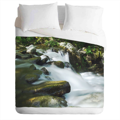 Warm and cozy fleece blanket with photo print of a mountain river - magical and fairytale environment