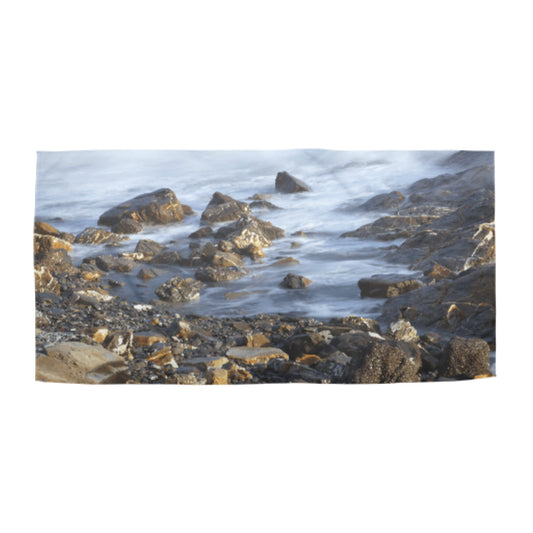 Beach towel photo of a rocky beach | Opposite Home