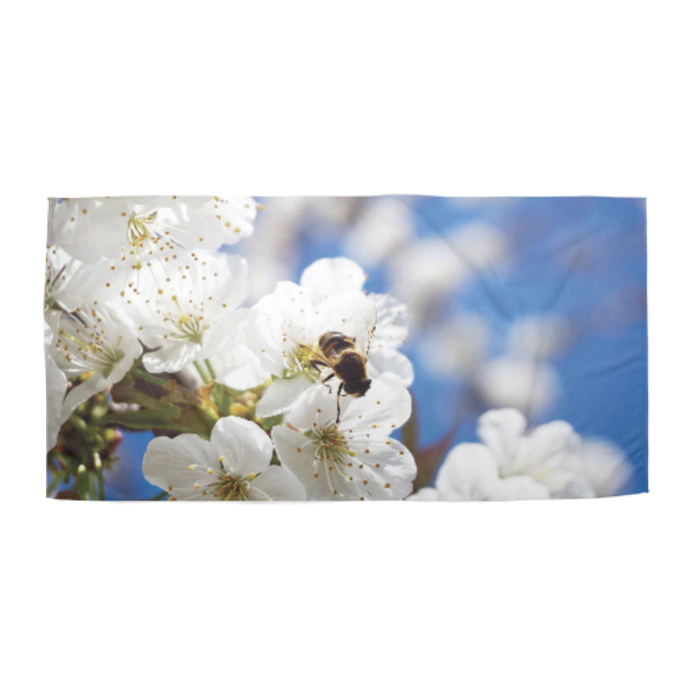 Beach towel photo of bee on cherry blossoms | Opposite Home