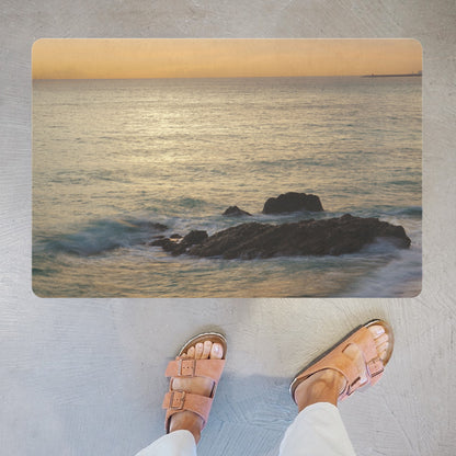 Decorative doormat with photographic print of a sunset on the sea - practical for bathroom and kitchen